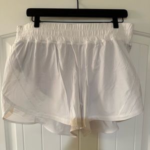 Lululemon White Track That Short 4” Lightly Worn. In great condition!
